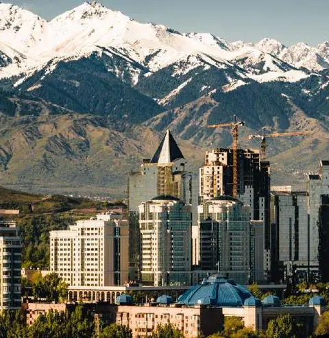 Almaty city below the snow-capped Trans-Ili Alatau